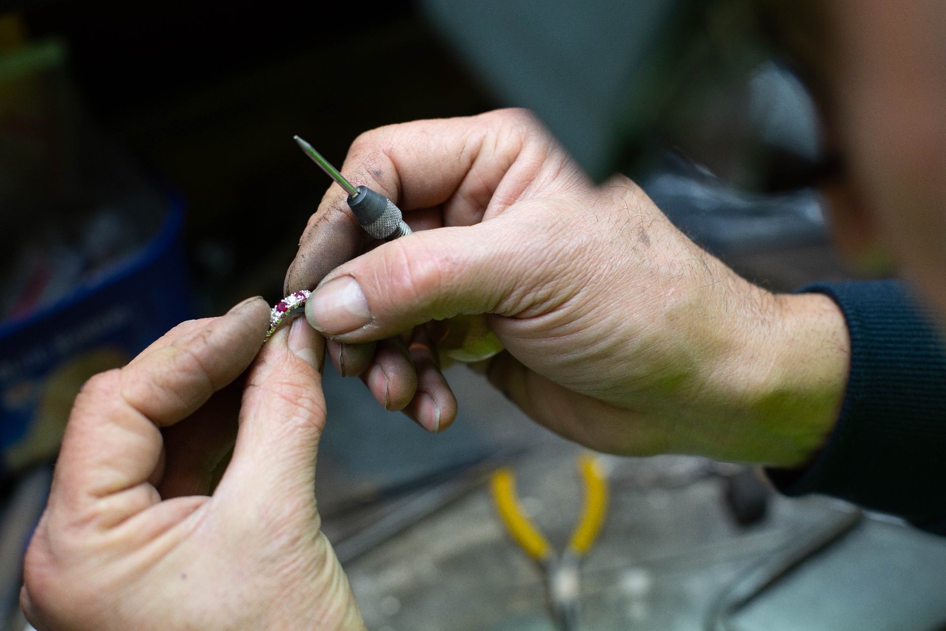 Master jeweller hand-crafting a precious ring